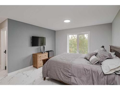 44092 & 44080 Township Road 274, Rural Rocky View County, AB - Indoor Photo Showing Bedroom