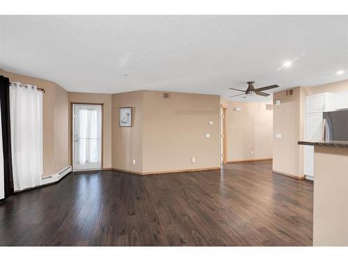 210-8535 Bonaventure Drive Se, Calgary, AB - Indoor Photo Showing Kitchen