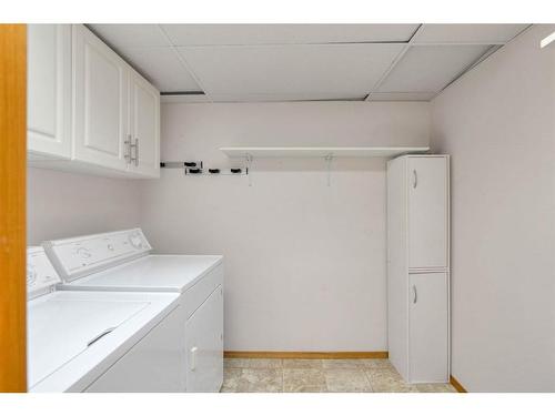 210-8535 Bonaventure Drive Se, Calgary, AB - Indoor Photo Showing Laundry Room