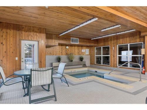 210-8535 Bonaventure Drive Se, Calgary, AB -  Photo Showing Other Room With In Ground Pool