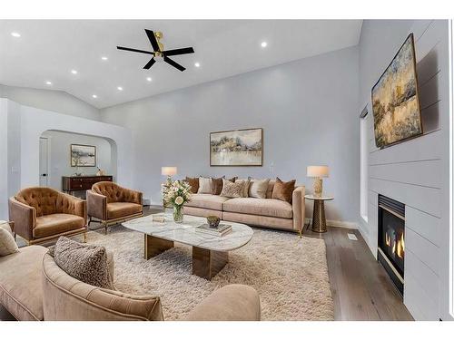 176 Stonegate Crescent Nw, Airdrie, AB - Indoor Photo Showing Living Room With Fireplace