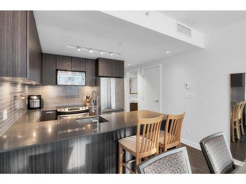 708-626 14 Avenue Sw, Calgary, AB - Indoor Photo Showing Kitchen With Stainless Steel Kitchen