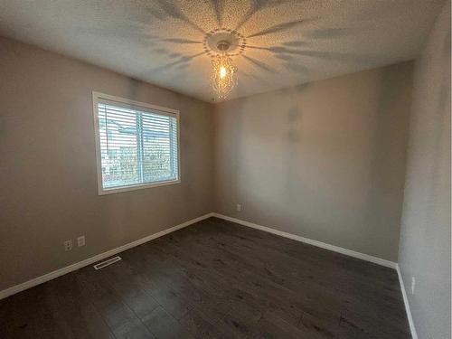 122 Evanscove Circle Nw, Calgary, AB - Indoor Photo Showing Other Room