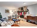 724 9Th Avenue Se, High River, AB  - Indoor Photo Showing Living Room With Fireplace 