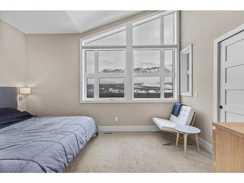 215 Riva Heights, Canmore, AB - Indoor Photo Showing Bedroom