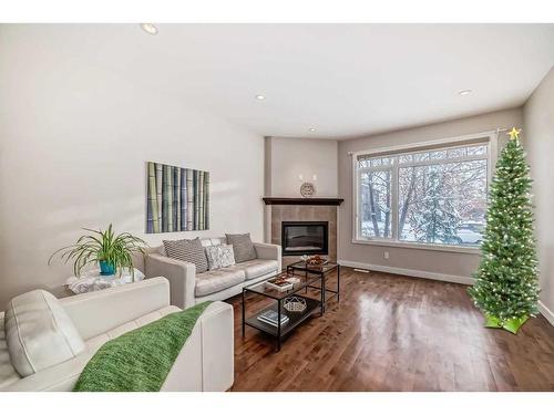 2416 1 Avenue Nw, Calgary, AB - Indoor Photo Showing Living Room With Fireplace