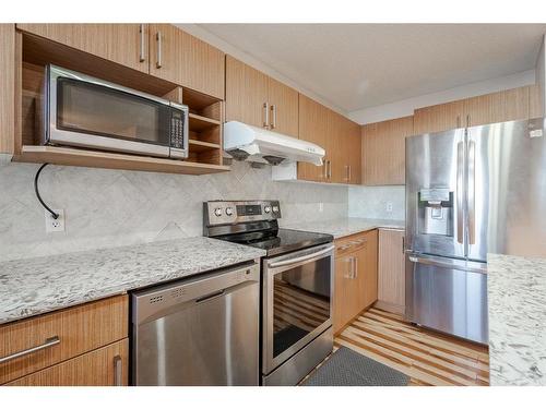 53 Martinbrook Road Ne, Calgary, AB - Indoor Photo Showing Kitchen