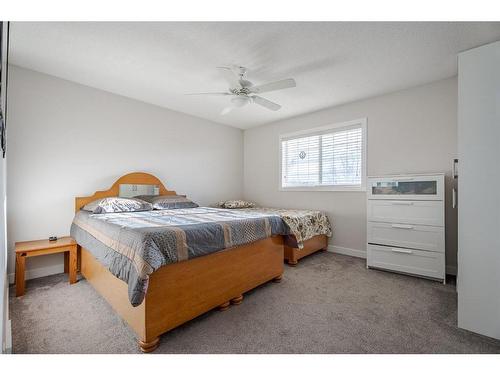 53 Martinbrook Road Ne, Calgary, AB - Indoor Photo Showing Bedroom