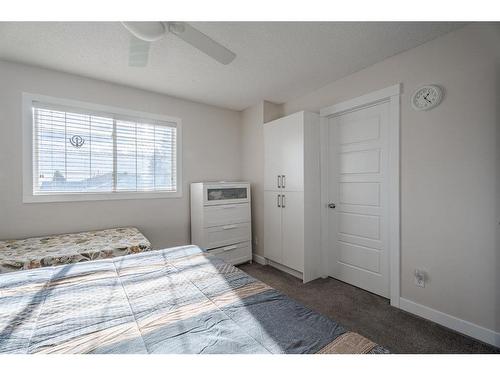 53 Martinbrook Road Ne, Calgary, AB - Indoor Photo Showing Bedroom