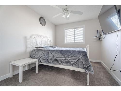 53 Martinbrook Road Ne, Calgary, AB - Indoor Photo Showing Bedroom