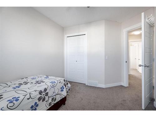 53 Martinbrook Road Ne, Calgary, AB - Indoor Photo Showing Bedroom