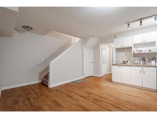 53 Martinbrook Road Ne, Calgary, AB - Indoor Photo Showing Kitchen With Double Sink