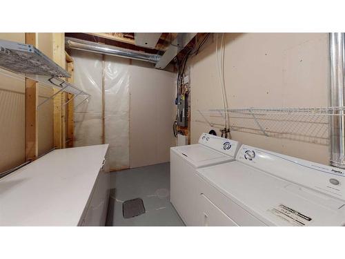 207 Cranberry Close Se, Calgary, AB - Indoor Photo Showing Laundry Room