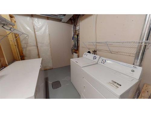 207 Cranberry Close Se, Calgary, AB - Indoor Photo Showing Laundry Room