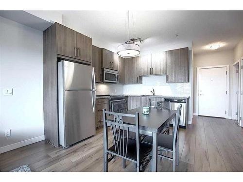 110-20 Sage Hill Terrace Nw, Calgary, AB - Indoor Photo Showing Kitchen With Stainless Steel Kitchen