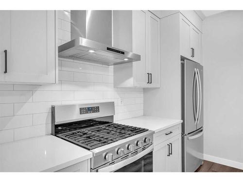 371 Hotchkiss Manor Se, Calgary, AB - Indoor Photo Showing Kitchen With Stainless Steel Kitchen With Upgraded Kitchen