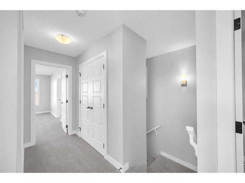 371 Hotchkiss Manor Se, Calgary, AB - Indoor Photo Showing Other Room