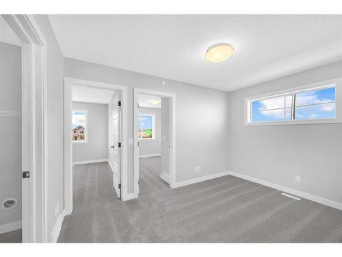 371 Hotchkiss Manor Se, Calgary, AB - Indoor Photo Showing Other Room