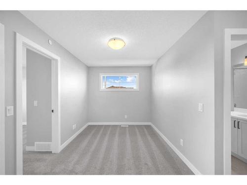 371 Hotchkiss Manor Se, Calgary, AB - Indoor Photo Showing Other Room