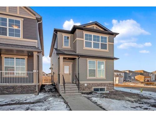 371 Hotchkiss Manor Se, Calgary, AB - Outdoor With Facade