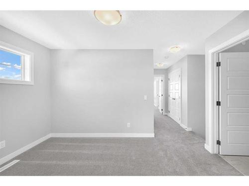 371 Hotchkiss Manor Se, Calgary, AB - Indoor Photo Showing Other Room