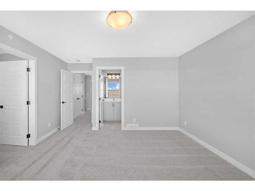 371 Hotchkiss Manor Se, Calgary, AB - Indoor Photo Showing Other Room