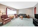 126 Somerset Drive Sw, Calgary, AB  - Indoor Photo Showing Living Room 