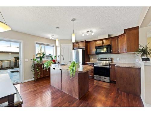 241 Elgin Meadows Park Se, Calgary, AB - Indoor Photo Showing Kitchen With Stainless Steel Kitchen