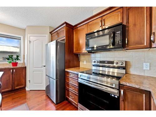 241 Elgin Meadows Park Se, Calgary, AB - Indoor Photo Showing Kitchen With Stainless Steel Kitchen