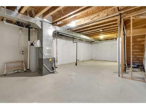 99 Evansborough Crescent Nw, Calgary, AB - Indoor Photo Showing Basement