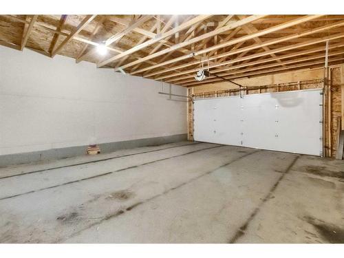 99 Evansborough Crescent Nw, Calgary, AB - Indoor Photo Showing Garage