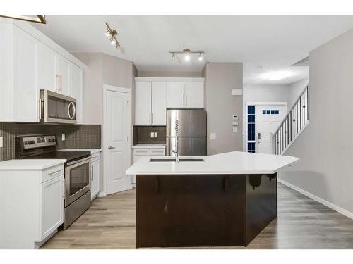 99 Evansborough Crescent Nw, Calgary, AB - Indoor Photo Showing Kitchen With Upgraded Kitchen