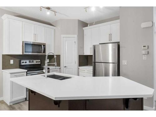 99 Evansborough Crescent Nw, Calgary, AB - Indoor Photo Showing Kitchen With Double Sink With Upgraded Kitchen