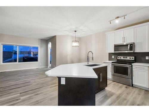 99 Evansborough Crescent Nw, Calgary, AB - Indoor Photo Showing Kitchen With Upgraded Kitchen