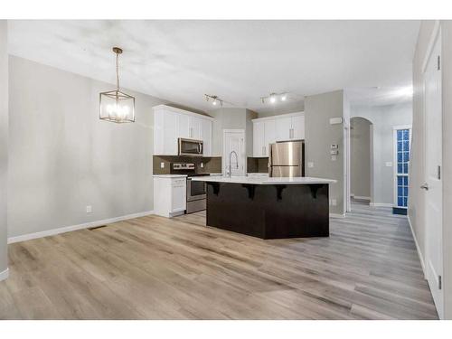 99 Evansborough Crescent Nw, Calgary, AB - Indoor Photo Showing Kitchen With Upgraded Kitchen