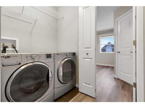 99 Evansborough Crescent Nw, Calgary, AB - Indoor Photo Showing Laundry Room