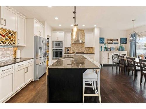 11 Storm Mountain Place, Okotoks, AB - Indoor Photo Showing Kitchen With Upgraded Kitchen