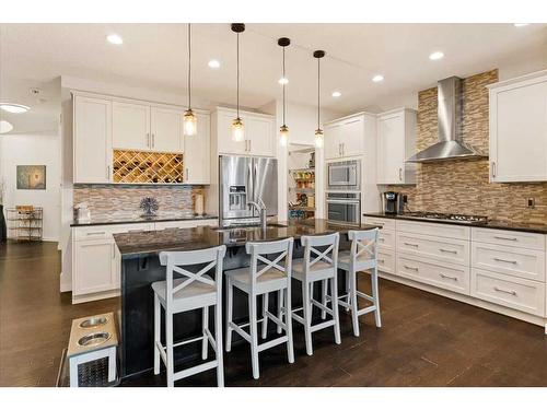 11 Storm Mountain Place, Okotoks, AB - Indoor Photo Showing Kitchen With Upgraded Kitchen