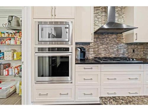 11 Storm Mountain Place, Okotoks, AB - Indoor Photo Showing Kitchen