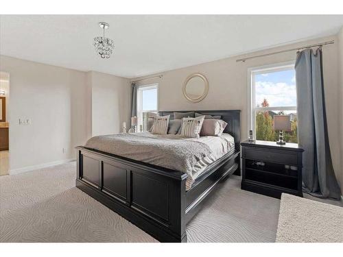 11 Storm Mountain Place, Okotoks, AB - Indoor Photo Showing Bedroom