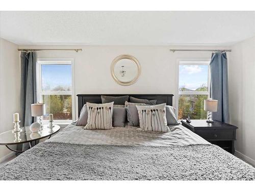 11 Storm Mountain Place, Okotoks, AB - Indoor Photo Showing Bedroom