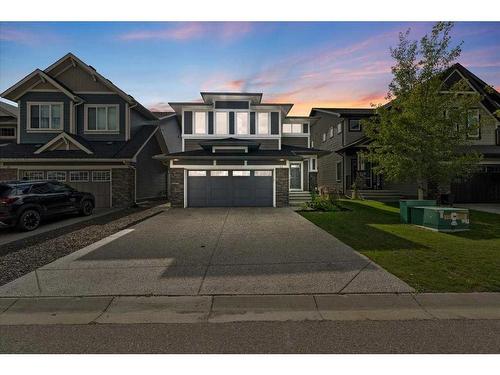 11 Storm Mountain Place, Okotoks, AB - Outdoor With Facade