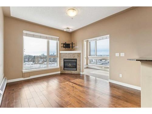 515-35 Inglewood Park Se, Calgary, AB - Indoor Photo Showing Living Room With Fireplace