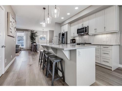 125 Cranbrook Villas Se, Calgary, AB - Indoor Photo Showing Kitchen With Upgraded Kitchen