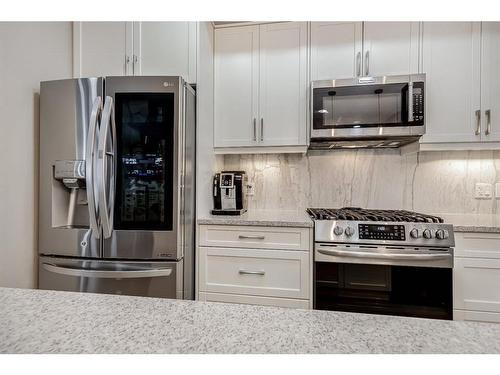 125 Cranbrook Villas Se, Calgary, AB - Indoor Photo Showing Kitchen With Upgraded Kitchen