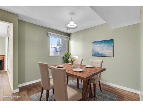 802-2520 Palliser Drive Sw, Calgary, AB - Indoor Photo Showing Dining Room