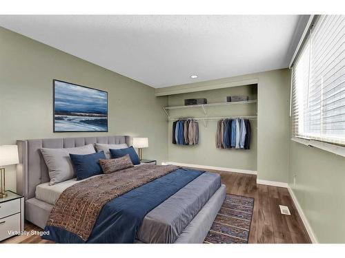 802-2520 Palliser Drive Sw, Calgary, AB - Indoor Photo Showing Bedroom