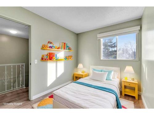 802-2520 Palliser Drive Sw, Calgary, AB - Indoor Photo Showing Bedroom