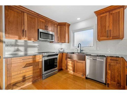 14 Deerview Heights Se, Calgary, AB - Indoor Photo Showing Kitchen With Stainless Steel Kitchen