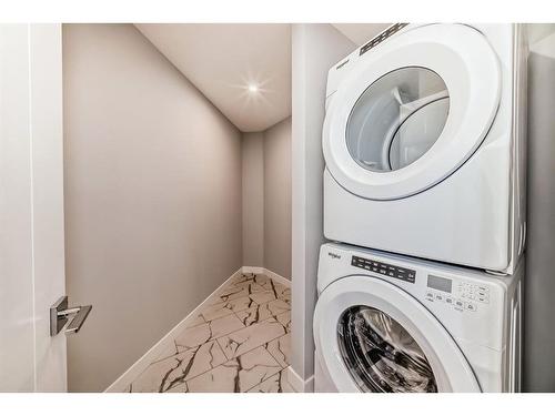 2210-681 Savanna Boulevard Ne, Calgary, AB - Indoor Photo Showing Laundry Room